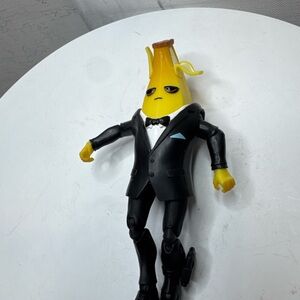 Yellow and Black Suit Action Figure